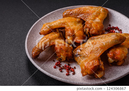 Grilled chicken wings with salt and spices 124306867