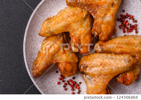 Grilled chicken wings with salt and spices Grilled chicken wings with salt and spices 124306868