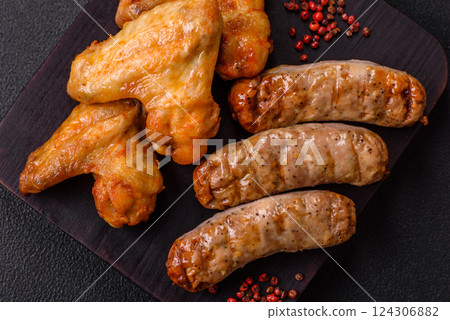 Grilled chicken wings with salt and spices Grilled chicken wings with salt and spices 124306882