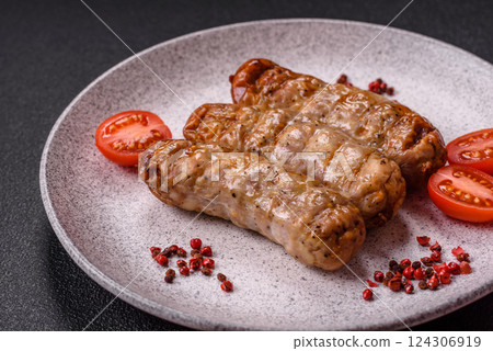 Juicy chicken or pork sausages with salt and spices 124306919