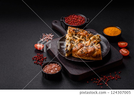 French quiche with chicken or salmon, cheese, salt, spices and herbs 124307005
