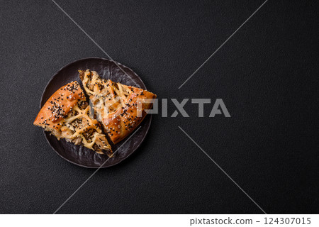 French quiche with chicken or salmon, cheese, salt, spices and herbs 124307015