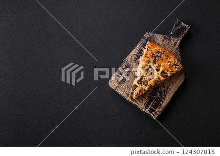 French quiche with chicken or salmon, cheese, salt, spices and herbs 124307018