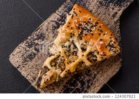 French quiche with chicken or salmon, cheese, salt, spices and herbs 124307021