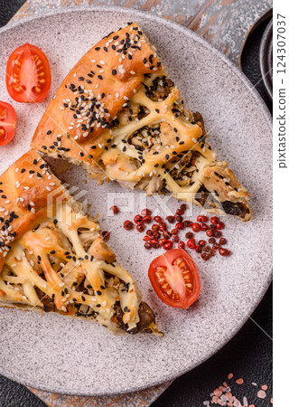 French quiche with chicken or salmon, cheese, salt, spices and herbs 124307037