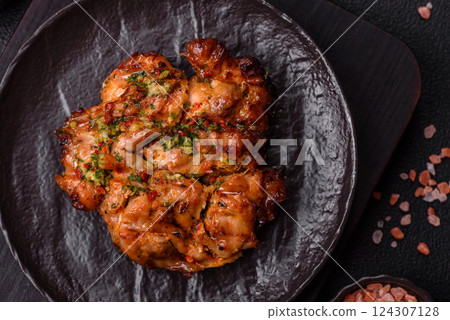 Grilled chicken fillet with garlic sauce, hot pepper Grilled chicken fillet with garlic sauce, hot pepper 124307128