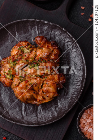 Grilled chicken fillet with garlic sauce, hot pepper 124307129