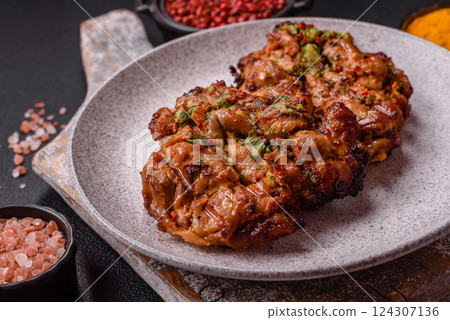 Grilled chicken fillet with garlic sauce, hot pepper Grilled chicken fillet with garlic sauce, hot pepper 124307136