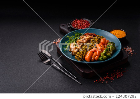 Quinoa bowl with tofu, steamed vegetables, grains, seeds and spices Quinoa bowl with tofu, steamed vegetables, grains, seeds and spices 124307292
