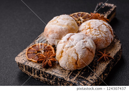Delicious round freshly baked lemon flavored cookies Delicious round freshly baked lemon flavored cookies 124307437