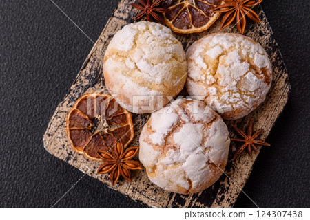 Delicious round freshly baked lemon flavored cookies Delicious round freshly baked lemon flavored cookies 124307438