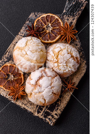 Delicious round freshly baked lemon flavored cookies 124307439