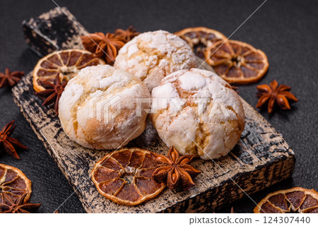 Delicious round freshly baked lemon flavored cookies Delicious round freshly baked lemon flavored cookies 124307440
