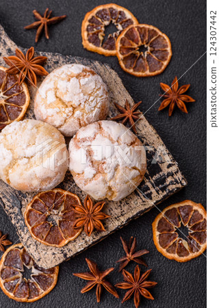 Delicious round freshly baked lemon flavored cookies Delicious round freshly baked lemon flavored cookies 124307442