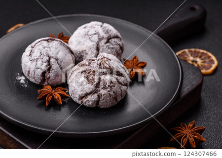 Delicious round freshly baked chocolate flavored cookies 124307466