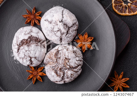 Delicious round freshly baked chocolate flavored cookies 124307467