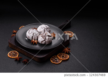 Delicious round freshly baked chocolate flavored cookies 124307469