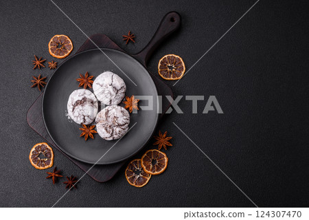 Delicious round freshly baked chocolate flavored cookies 124307470