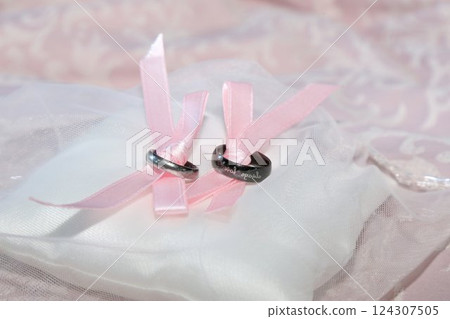 Wedding rings, paired engagement rings on a ring pillow Handmade sterling silver paired rings Wedding rings, paired engagement rings on a ring pillow Handmade sterling silver paired rings 124307505