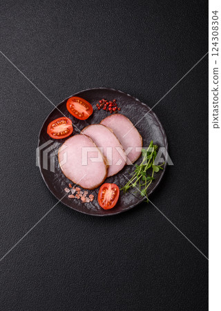 Meat, smoked, ham sliced with salt, spices and herbs 124308304