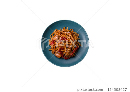 Delicious Asian food udon with noodles, chicken, hot pepper, vegetables 124308427