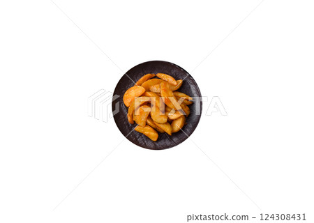 Baked potato wedges with cheese and herbs on a white background Baked potato wedges with cheese and herbs on a white background 124308431
