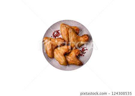 Grilled chicken wings with salt and spices 124308535