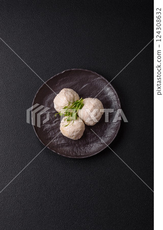 Delicious healthy steamed chicken cutlets or minced meatballs Delicious healthy steamed chicken cutlets or minced meatballs 124308632