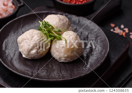 Delicious healthy steamed chicken cutlets or minced meatballs Delicious healthy steamed chicken cutlets or minced meatballs 124308635