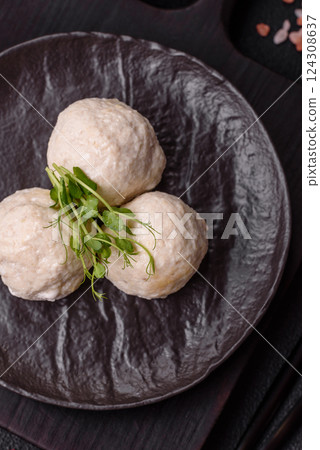 Delicious healthy steamed chicken cutlets or minced meatballs 124308637