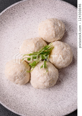 Delicious healthy steamed chicken cutlets or minced meatballs Delicious healthy steamed chicken cutlets or minced meatballs 124308646