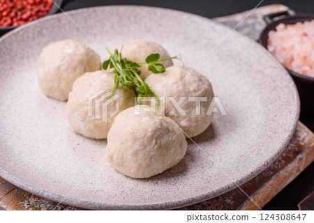 Delicious healthy steamed chicken cutlets or minced meatballs 124308647