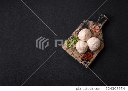 Delicious healthy steamed chicken cutlets or minced meatballs 124308654