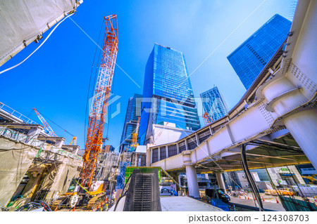 Tokyo cityscape in Japan: Farewell Shibuya Station West Exit... Summer-like sky spreads out... = 21st 124308703