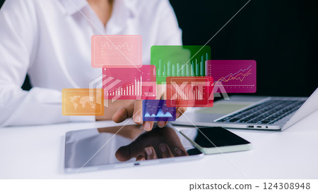 Business analytics with charts, KPIs to improve organizational performance, Businesswoman use computers to analyze business and manage corporate data in office, Financial and marketing strategy. Business analytics with charts, KPIs to improve organizational performance, Businesswoman use computers to analyze business and manage corporate data in office, Financial and marketing strategy. 124308948