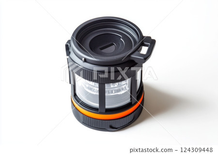 A modern portable camping lantern with a sleek design. This versatile light source is ideal for outdoor adventures. Stay bright and safe while camping. Generative AI A modern portable camping lantern with a sleek design. This versatile light source is ideal for outdoor adventures. Stay bright and safe while camping. Generative AI 124309448