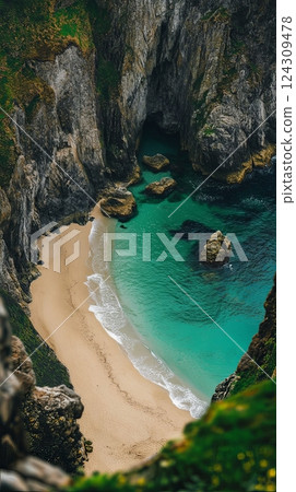 A secluded beach nestled between cliffs. The turquoise water gently laps at the shoreline. Rocks add character to this hidden gem. Perfect for relaxation and exploration. Generative AI 124309478