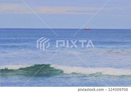 fishing boat on the horizon 124309708