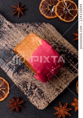 Round sweet New York roll croissant with raspberry cream filling Round sweet New York roll croissant with raspberry cream filling 124310044