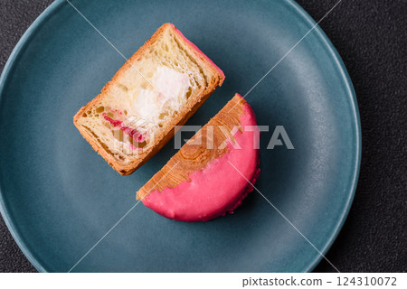 Round sweet New York roll croissant with raspberry cream filling Round sweet New York roll croissant with raspberry cream filling 124310072