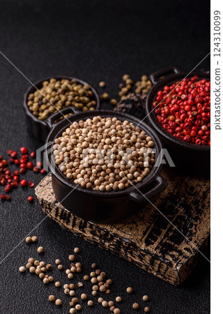 White allspice in a ceramic bowl White allspice in a ceramic bowl 124310099