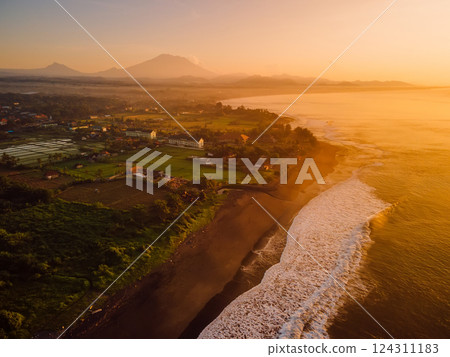 Coastline with green cliffs and ocean in Bali island. Aerial view of Pandawa beach 124311183