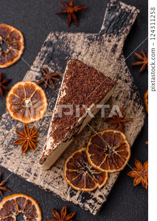 Delicious sweet piece of cheesecake with mascarpone cheese 124311258