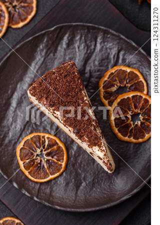 Delicious sweet piece of cheesecake with mascarpone cheese Delicious sweet piece of cheesecake with mascarpone cheese 124311270