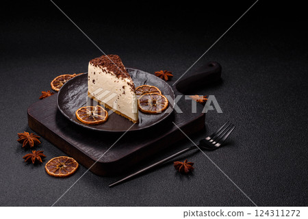 Delicious sweet piece of cheesecake with mascarpone cheese 124311272