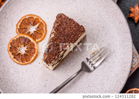 Delicious sweet piece of cheesecake with mascarpone cheese 124311282