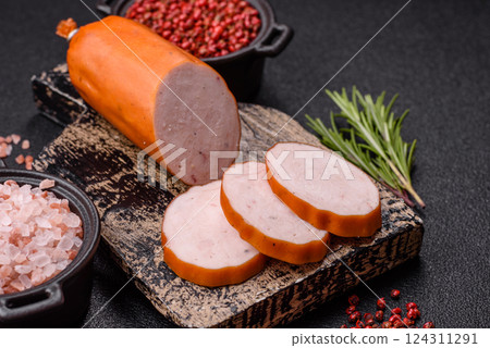 Delicious fresh ham cut into round slices with salt, spices and herbs 124311291