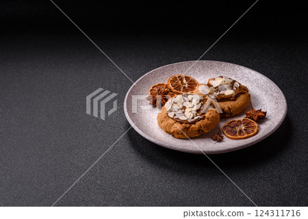 Round cookies with nuts and chocolate butter Round cookies with nuts and chocolate butter 124311716