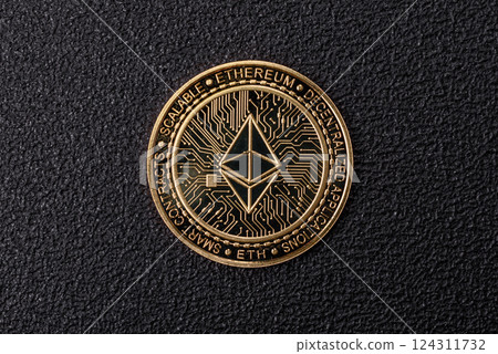 Ethereum cryptocurrency dummy in the form of a round iron coin 124311732