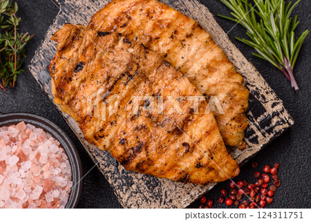 Delicious fresh grilled chicken fillet with spices and herbs 124311751